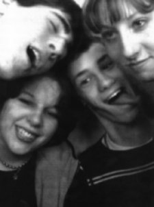 carrie, jay, jeanne, and me in a photobooth.